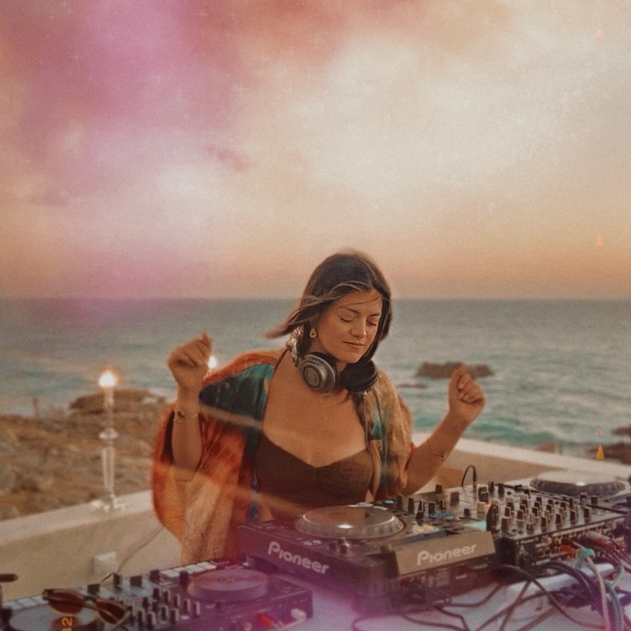 Marsseia DJing at sunset by the sea