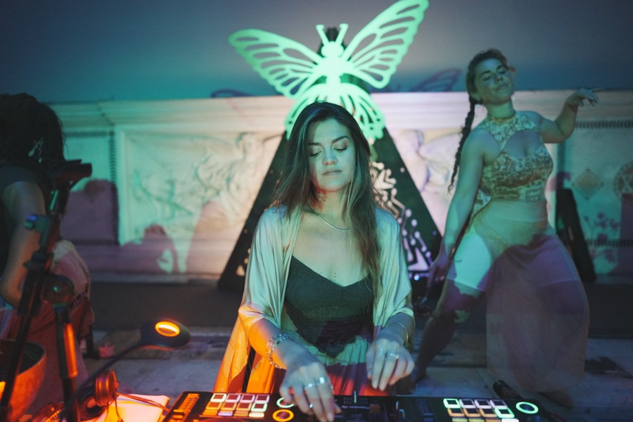 Marsseia at the decks with a dancer beside her